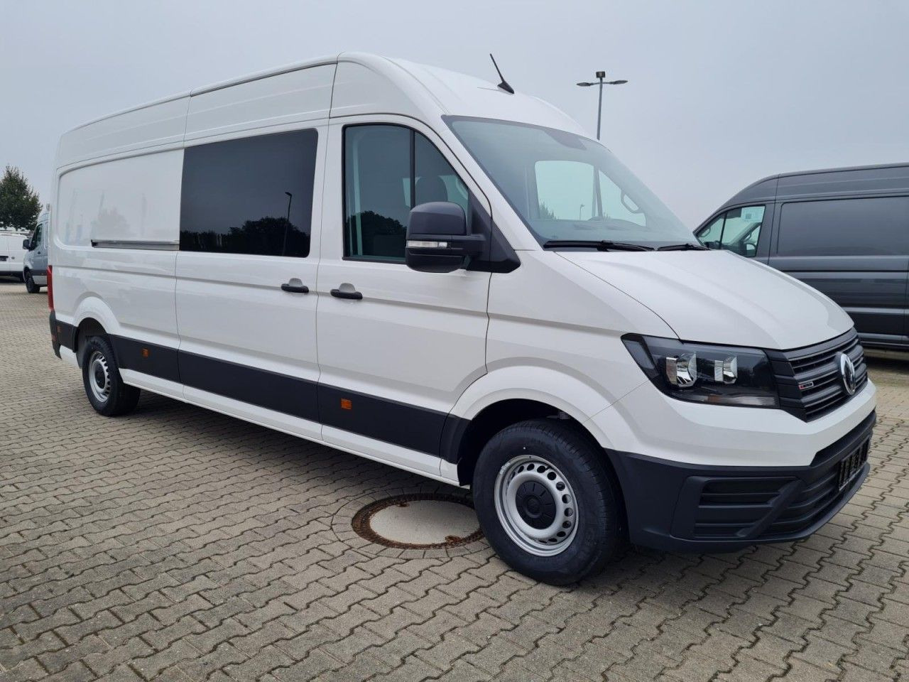 Volkswagen Crafter 35 Kasten Plus 4MOTION Doka Mixto L4H3 - Kravas mikroautobuss, Kravas-pasažieru furgons: foto 3 Volkswagen Crafter 35 Kasten Plus 4MOTION Doka Mixto L4H3 - Kravas mikroautobuss, Kravas-pasažieru furgons: foto 3