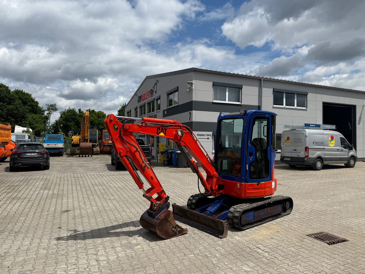 Caterpillar 303C Minibagger - Ekskavators: foto 1 Caterpillar 303C Minibagger - Ekskavators: foto 1