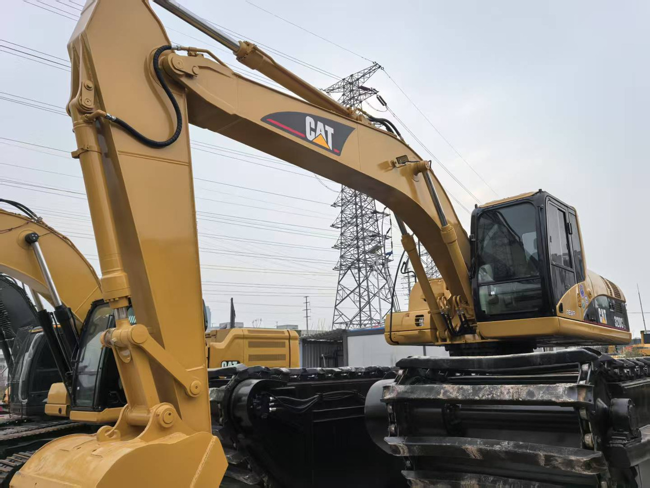 CATERPILLAR 320CL amphibious - Ekskavators-amfībijs: foto 5 CATERPILLAR 320CL amphibious - Ekskavators-amfībijs: foto 5