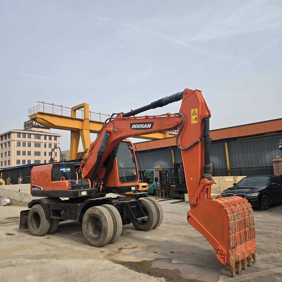 DOOSAN DX150W - Riteņu ekskavators: foto 1 DOOSAN DX150W - Riteņu ekskavators: foto 1