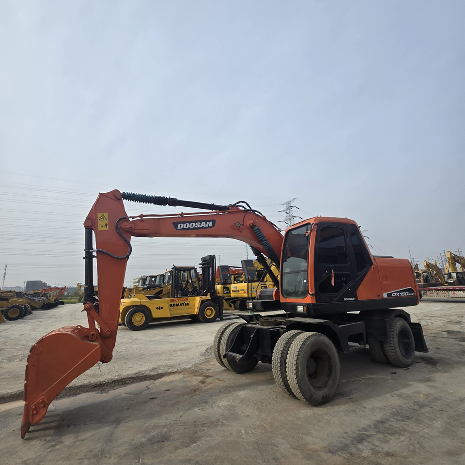 DOOSAN DX150W - Riteņu ekskavators: foto 3 DOOSAN DX150W - Riteņu ekskavators: foto 3