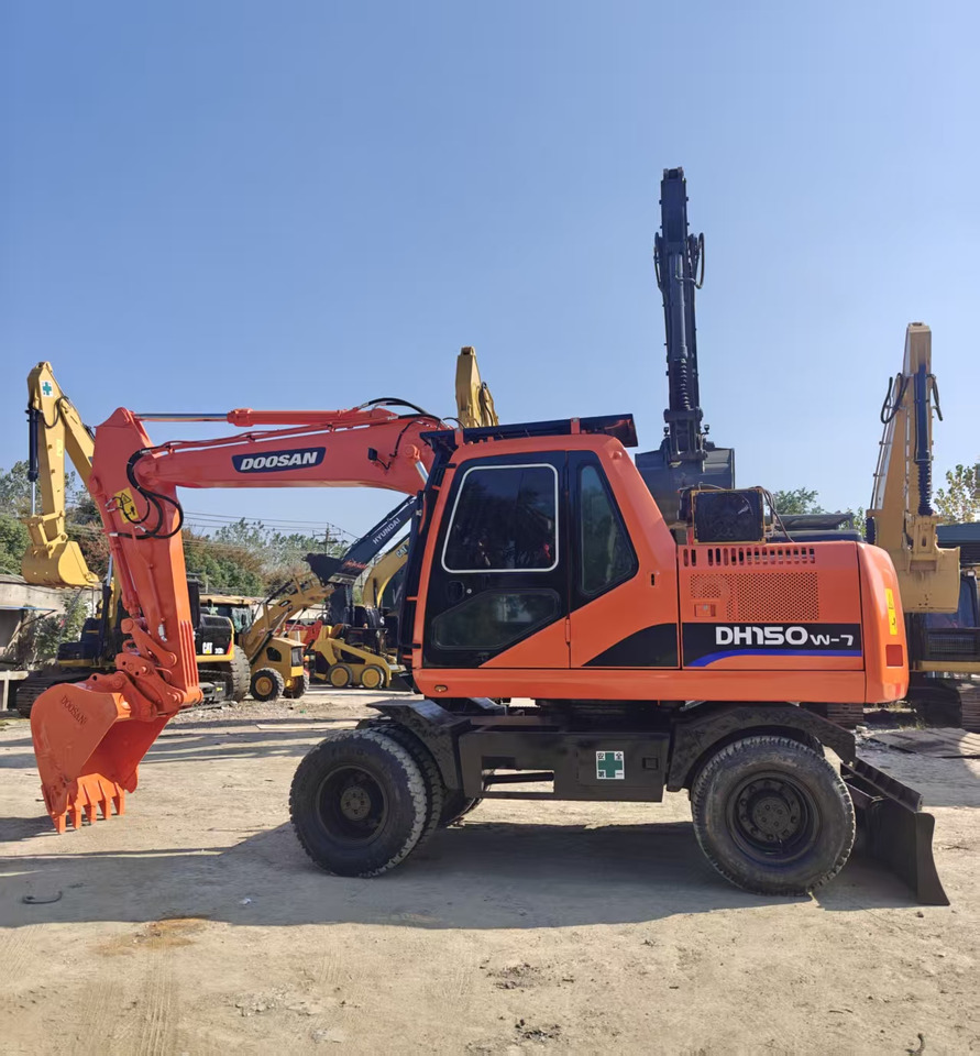 Doosan DH150W - Riteņu ekskavators: foto 2 Doosan DH150W - Riteņu ekskavators: foto 2