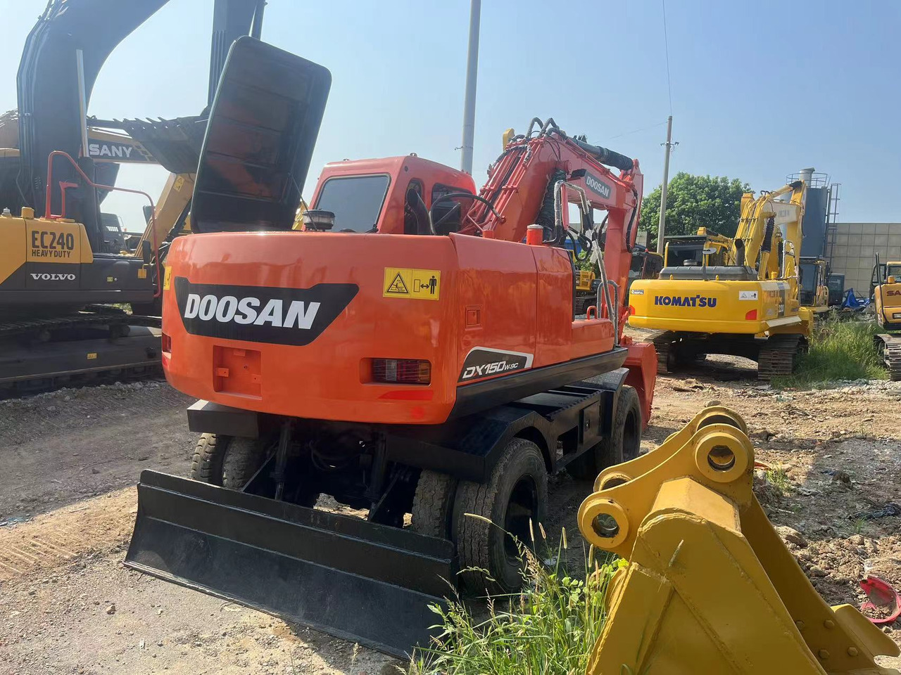Doosan DX150W-9C - Riteņu ekskavators: foto 2 Doosan DX150W-9C - Riteņu ekskavators: foto 2