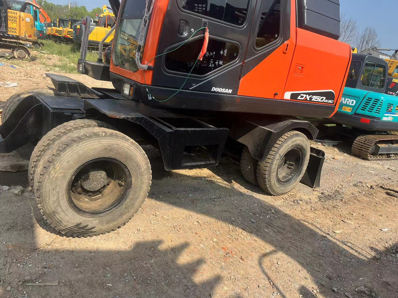 Doosan DX150W-9C - Riteņu ekskavators: foto 5 Doosan DX150W-9C - Riteņu ekskavators: foto 5