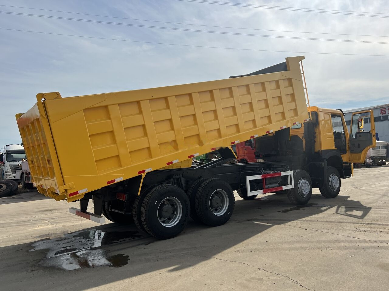 Howo - Kravas automašīna pašizgāzējs: foto 3 Howo - Kravas automašīna pašizgāzējs: foto 3