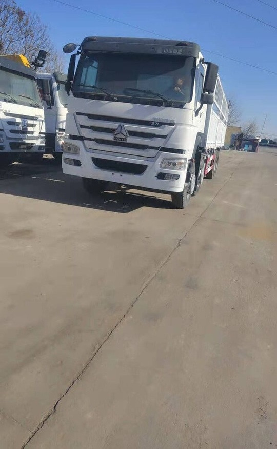 Sinotruk HOWO 8*4 Dump truck - Bortu kravas automašīna/ Platforma: foto 2 Sinotruk HOWO 8*4 Dump truck - Bortu kravas automašīna/ Platforma: foto 2