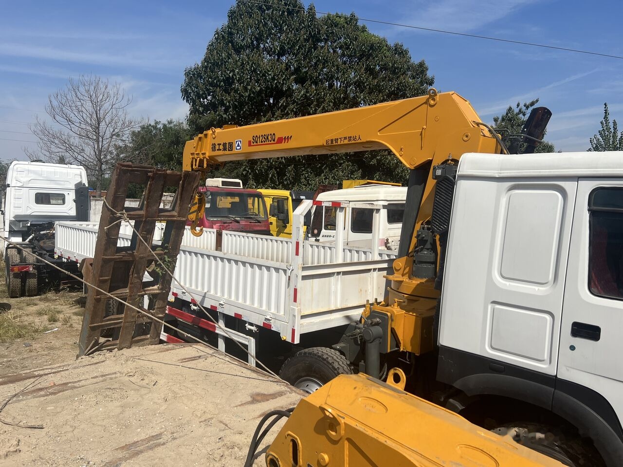 XCMG SQ12SK3Q Selfloader Truck - Celtnis-manipulators: foto 1 XCMG SQ12SK3Q Selfloader Truck - Celtnis-manipulators: foto 1