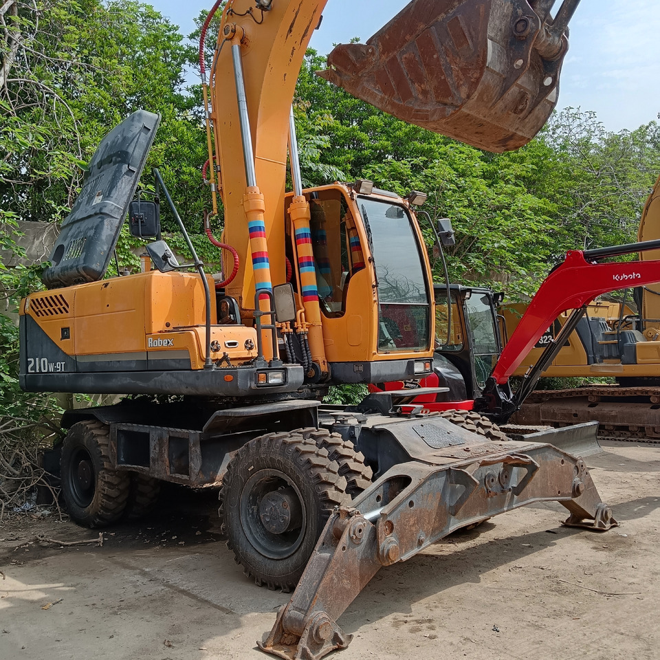 HYUNDAI 210W-9 T - Riteņu ekskavators: foto 4 HYUNDAI 210W-9 T - Riteņu ekskavators: foto 4