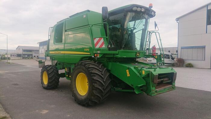 John Deere C 670 - Labības kombains: foto 1 John Deere C 670 - Labības kombains: foto 1