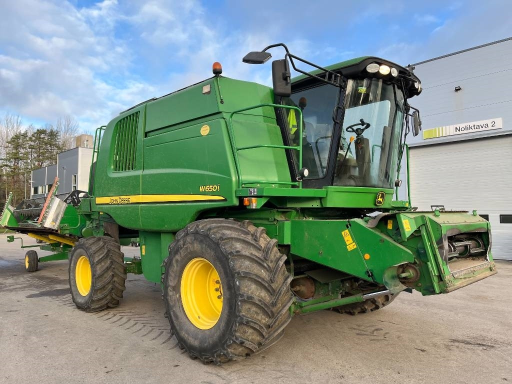 John Deere W 650 i - Labības kombains: foto 1 John Deere W 650 i - Labības kombains: foto 1