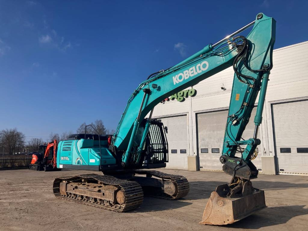 Kobelco SK 210 LC-10 - Kāpurķēžu ekskavators: foto 4 Kobelco SK 210 LC-10 - Kāpurķēžu ekskavators: foto 4