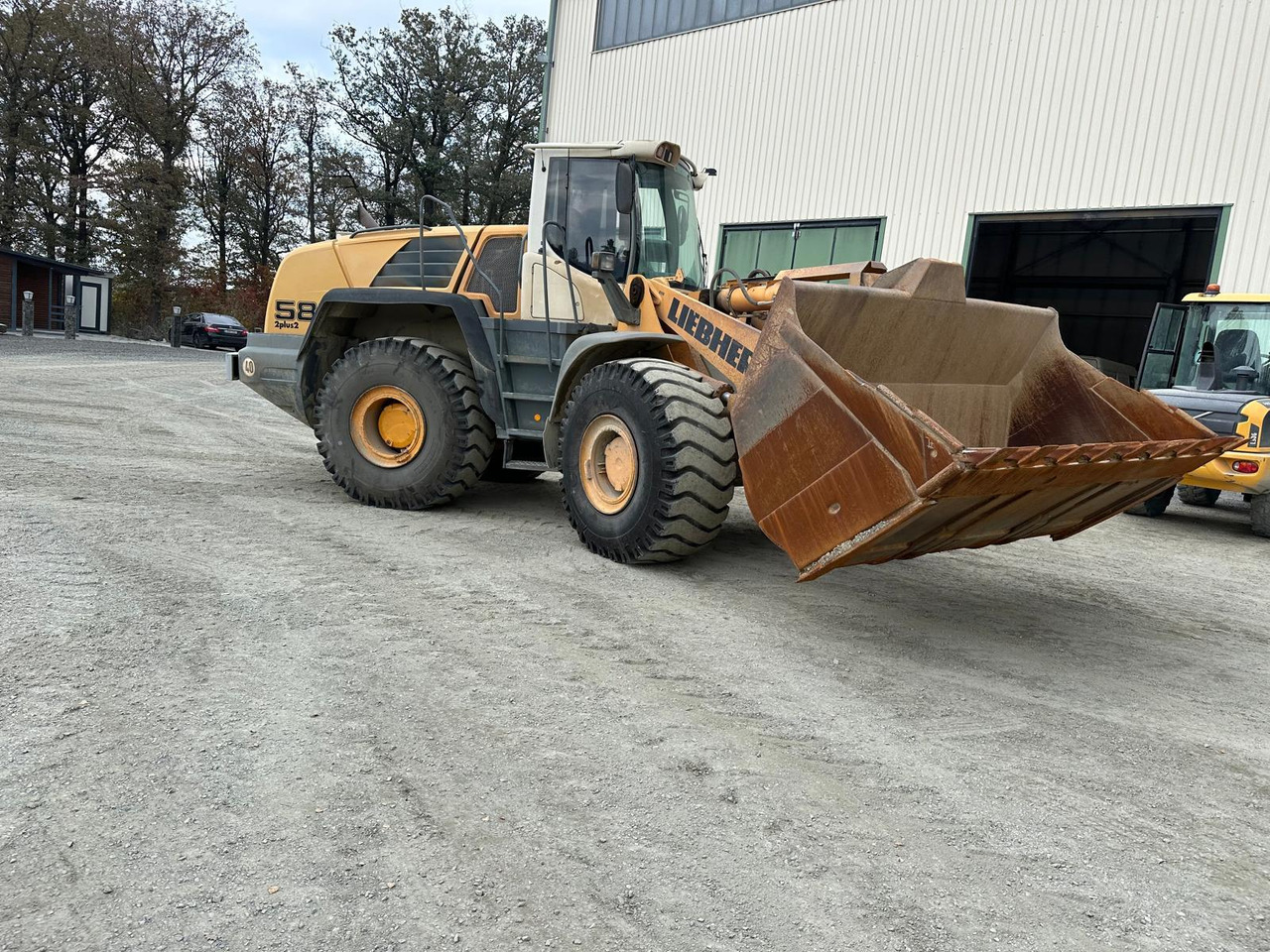 Liebherr L 580 2 plus 2 - Riteņu iekrāvējs: foto 1 Liebherr L 580 2 plus 2 - Riteņu iekrāvējs: foto 1