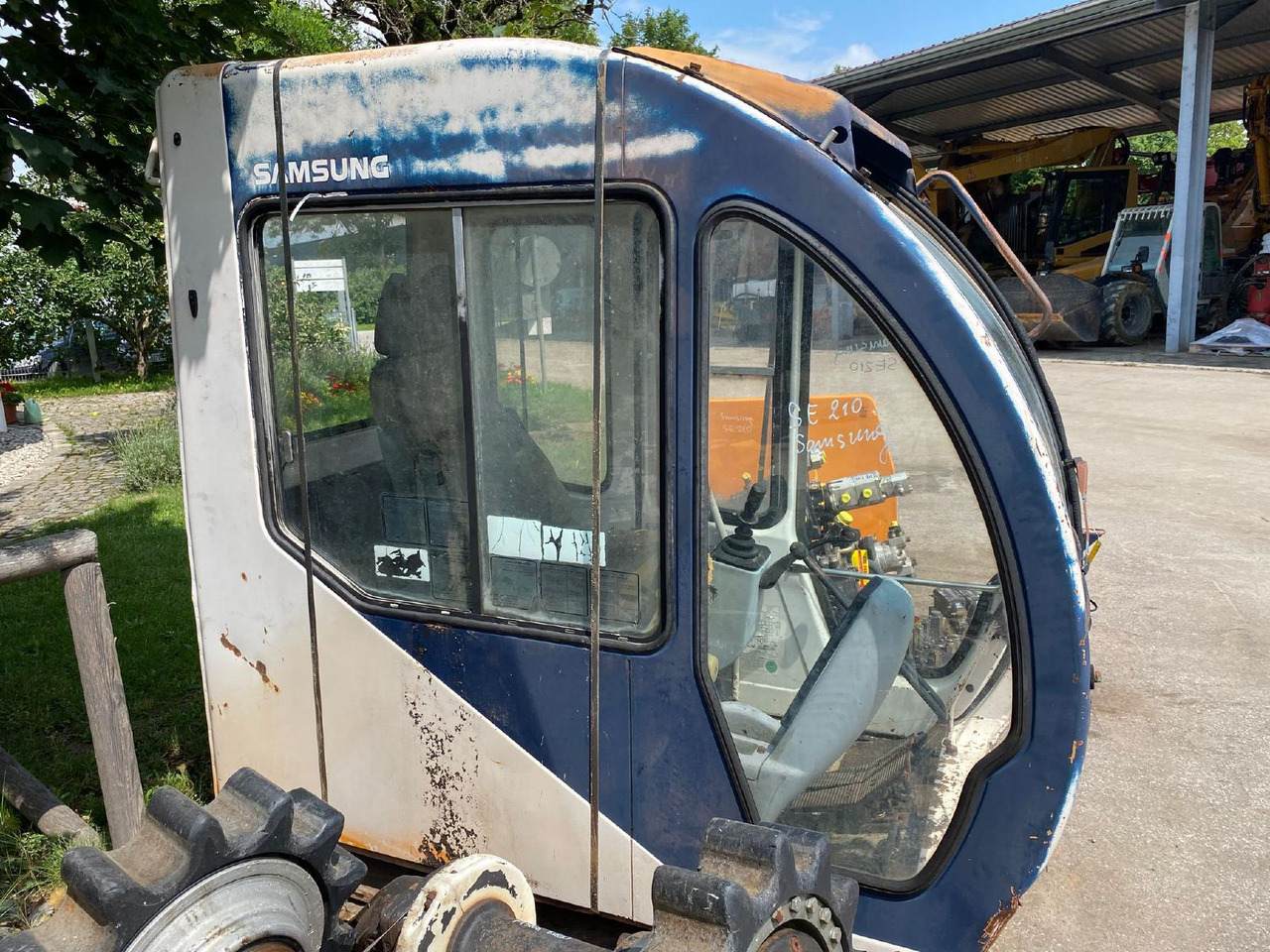 Samsung SE 210 - Kabīne - Celtniecības tehnika: foto 5 Samsung SE 210 - Kabīne - Celtniecības tehnika: foto 5