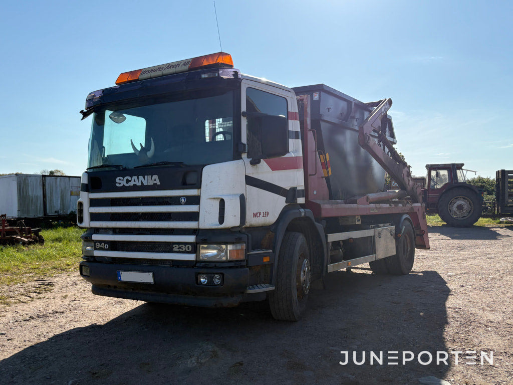 Scania Lastbil med lastväxslarflak - Būvgružu konteineru vedējs: foto 1 Scania Lastbil med lastväxslarflak - Būvgružu konteineru vedējs: foto 1