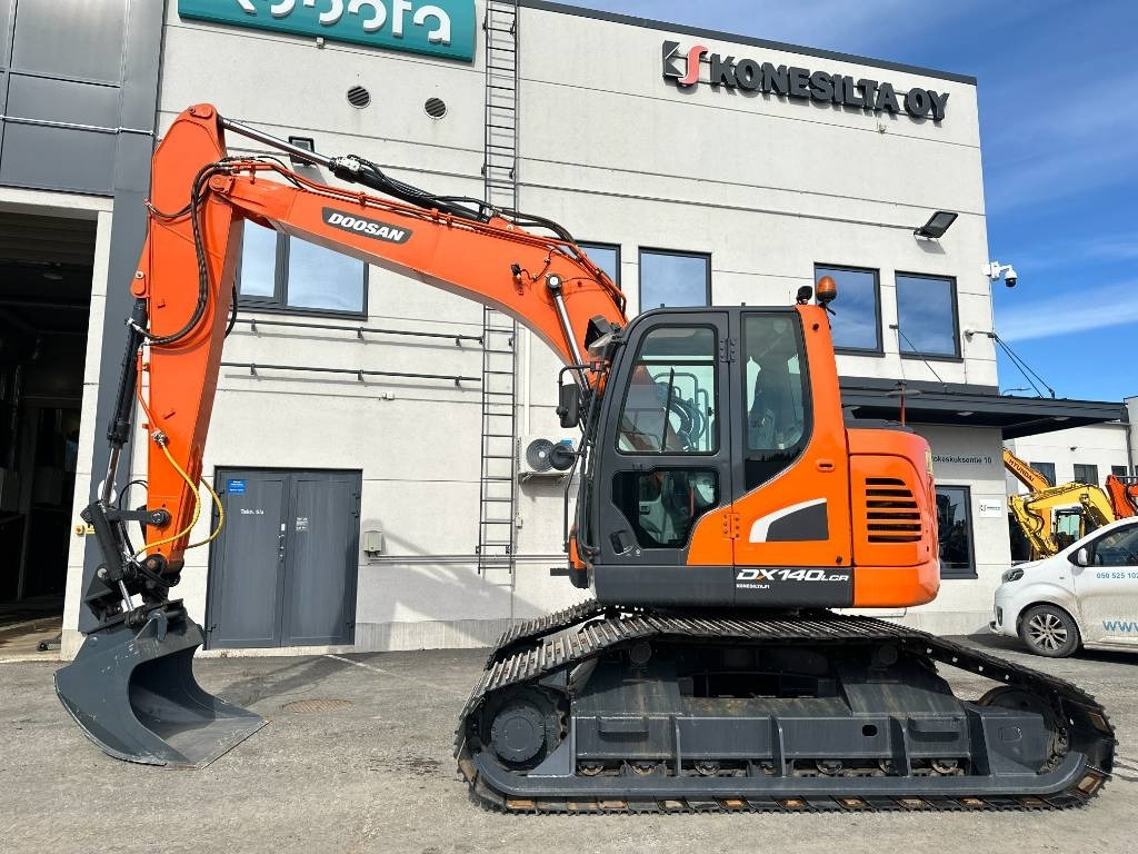 Doosan DX 140 LCR-5 metsäalusta - Kāpurķēžu ekskavators: foto 1 Doosan DX 140 LCR-5 metsäalusta - Kāpurķēžu ekskavators: foto 1