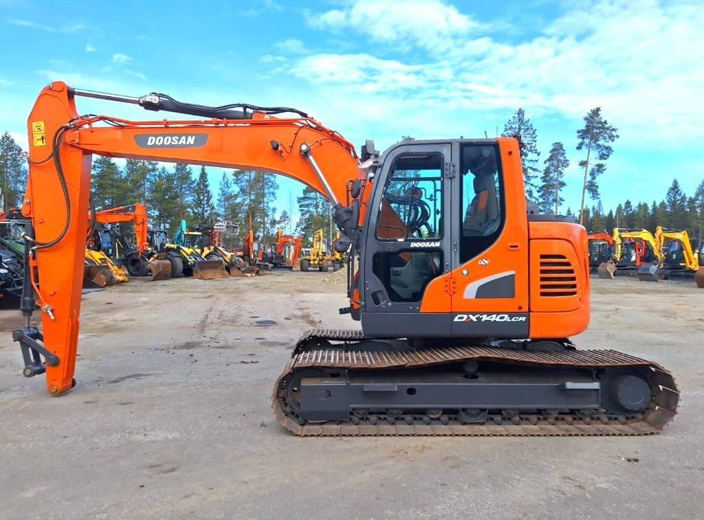 Doosan DX140LCR-5 - Kāpurķēžu ekskavators: foto 1 Doosan DX140LCR-5 - Kāpurķēžu ekskavators: foto 1