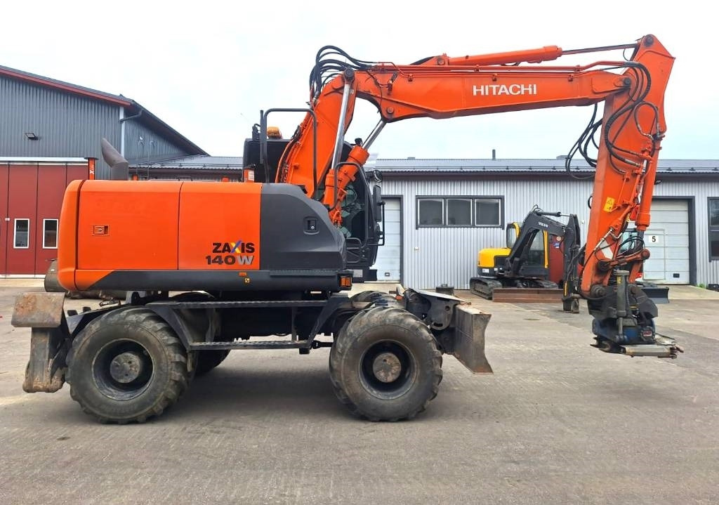 Hitachi ZX140W-5 HUIPPUVARUSTEET - Riteņu ekskavators: foto 5 Hitachi ZX140W-5 HUIPPUVARUSTEET - Riteņu ekskavators: foto 5