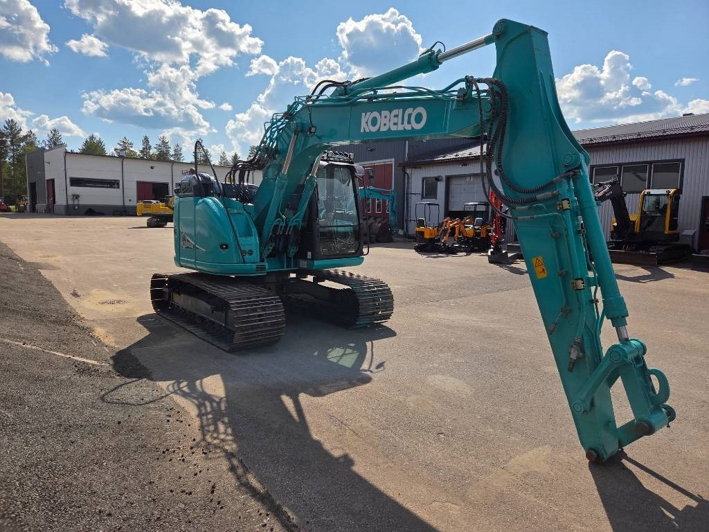 Kobelco SK140SRLC-5 - Kāpurķēžu ekskavators: foto 4 Kobelco SK140SRLC-5 - Kāpurķēžu ekskavators: foto 4