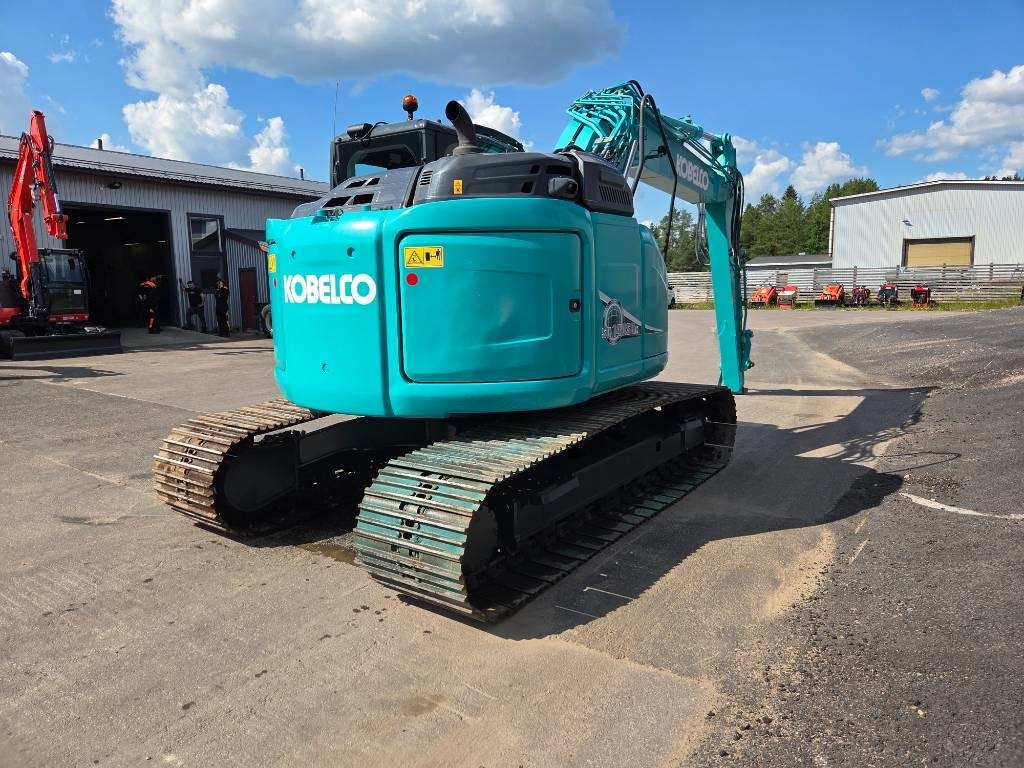 Kobelco SK140SRLC-5 - Kāpurķēžu ekskavators: foto 3 Kobelco SK140SRLC-5 - Kāpurķēžu ekskavators: foto 3