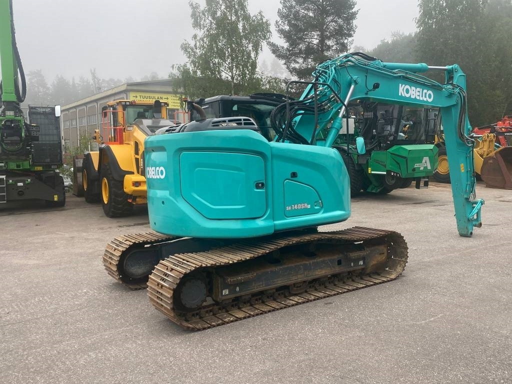 Kobelco SK140SRLC-7 - Kāpurķēžu ekskavators: foto 3 Kobelco SK140SRLC-7 - Kāpurķēžu ekskavators: foto 3