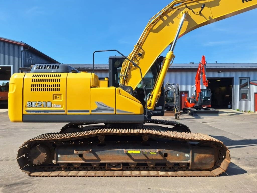 Kobelco SK210LC-11 PYÖRITTÄJÄLLÄ - Kāpurķēžu ekskavators: foto 5 Kobelco SK210LC-11 PYÖRITTÄJÄLLÄ - Kāpurķēžu ekskavators: foto 5