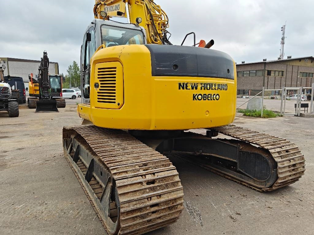 New Holland E200SRLC KALLISTUVA KAUHA - Kāpurķēžu ekskavators: foto 3 New Holland E200SRLC KALLISTUVA KAUHA - Kāpurķēžu ekskavators: foto 3