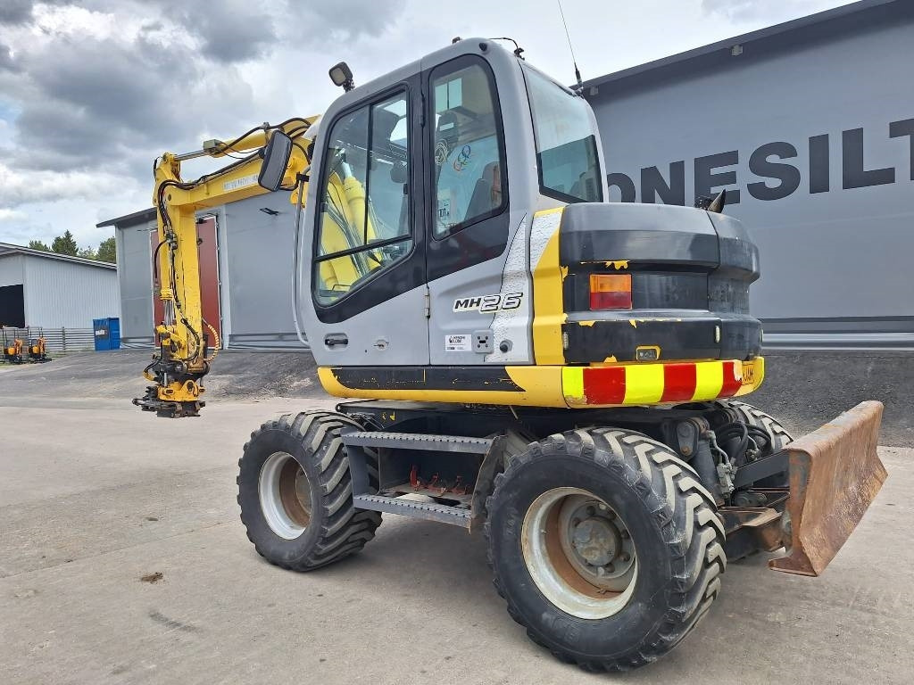New Holland MYYTY! SOLD! MH2.6 ENGCON PIHDEILLÄ - Riteņu ekskavators: foto 2 New Holland MYYTY! SOLD! MH2.6 ENGCON PIHDEILLÄ - Riteņu ekskavators: foto 2