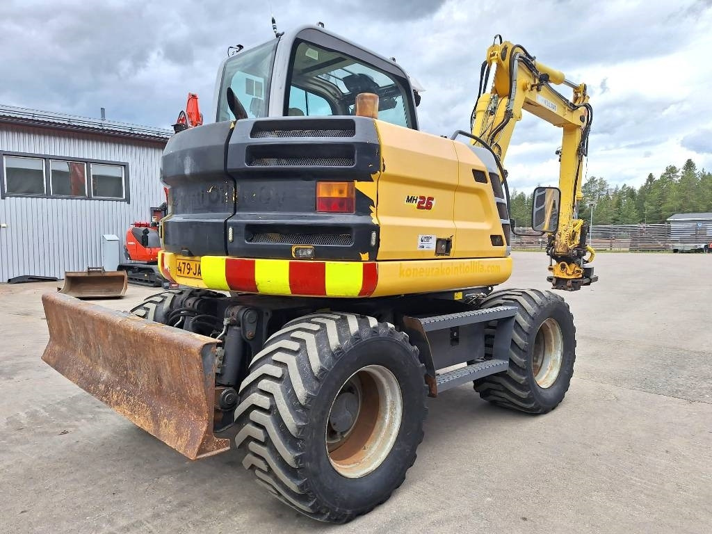 New Holland MYYTY! SOLD! MH2.6 ENGCON PIHDEILLÄ - Riteņu ekskavators: foto 4 New Holland MYYTY! SOLD! MH2.6 ENGCON PIHDEILLÄ - Riteņu ekskavators: foto 4
