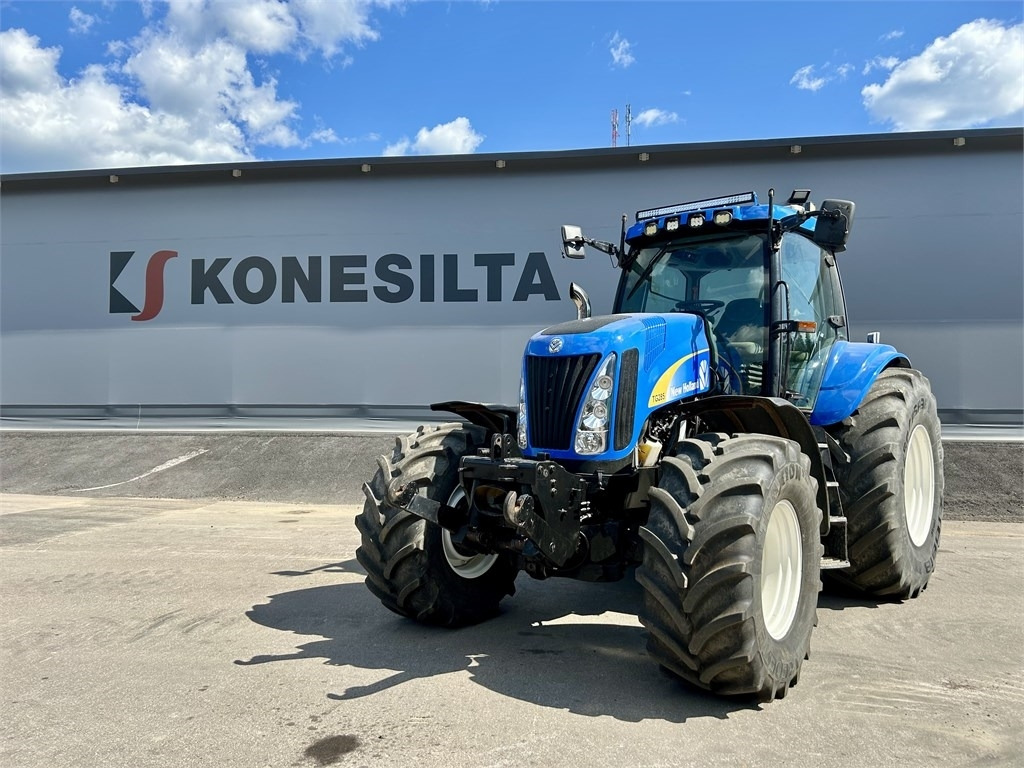 New Holland TG285 - Traktors: foto 1 New Holland TG285 - Traktors: foto 1
