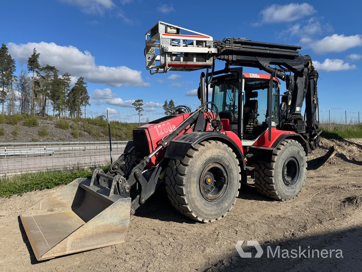 Grävlastare Huddig 1260B - Ekskavators-iekrāvējs: foto 1 Grävlastare Huddig 1260B - Ekskavators-iekrāvējs: foto 1