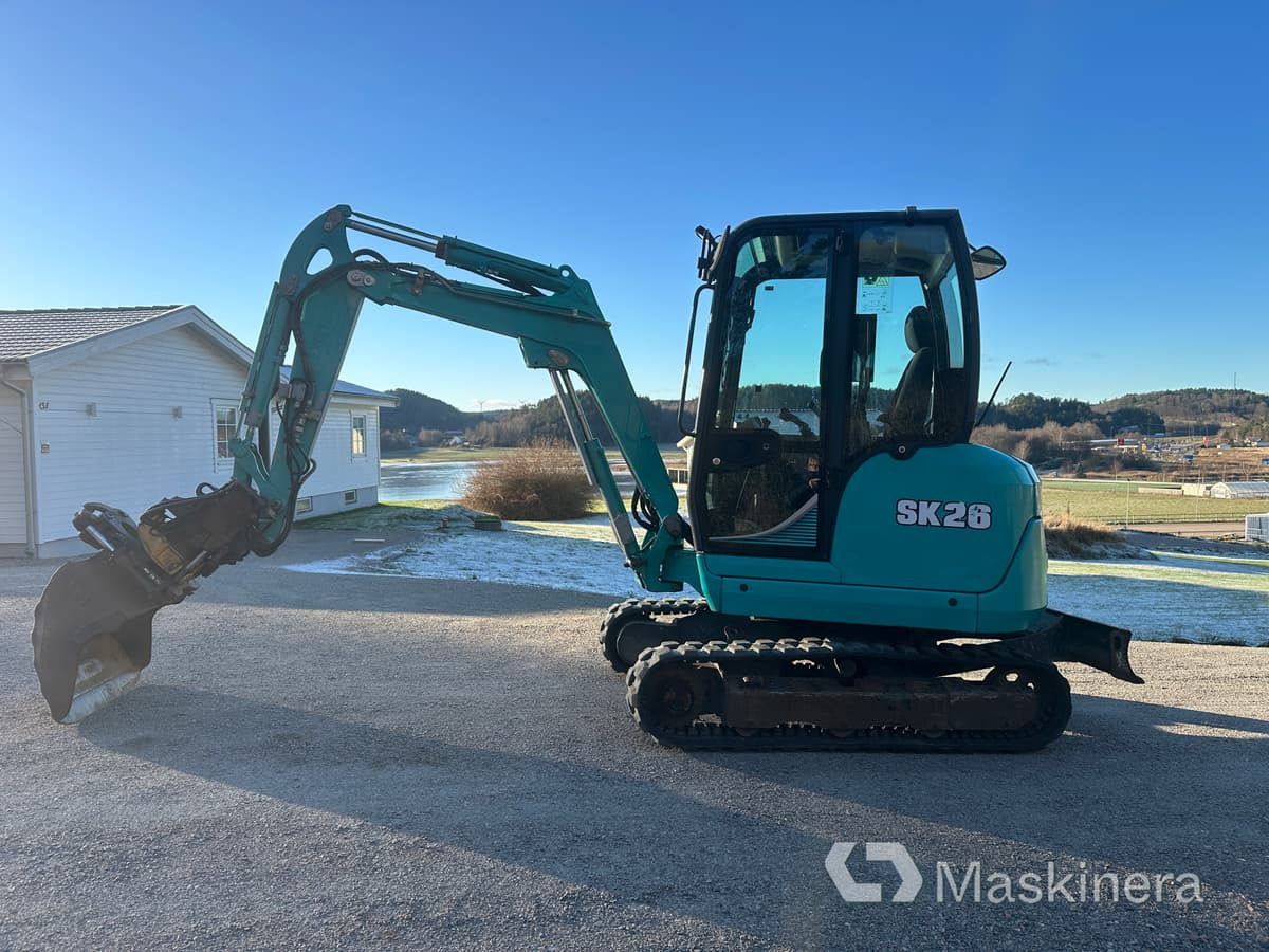 Grävmaskin Kobelco SK26 - Kāpurķēžu ekskavators: foto 2 Grävmaskin Kobelco SK26 - Kāpurķēžu ekskavators: foto 2