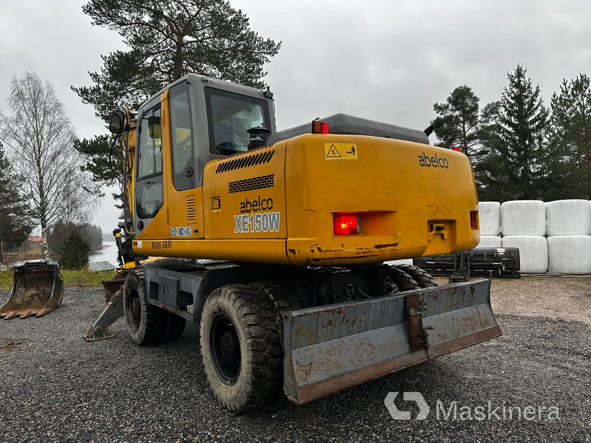 Hjulgrävare XCMG XE150W med flertal redskap - Kāpurķēžu ekskavators: foto 3 Hjulgrävare XCMG XE150W med flertal redskap - Kāpurķēžu ekskavators: foto 3