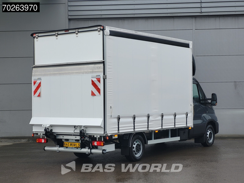 Iveco Daily 35S18 3.0L Automaat Schuifzeilen met Laadklep ACC Navi Bakwagen Schuifzeil Zeilen Koffer Meubelbak 22m3 Airco - Furgons ar tentu: foto 2 Iveco Daily 35S18 3.0L Automaat Schuifzeilen met Laadklep ACC Navi Bakwagen Schuifzeil Zeilen Koffer Meubelbak 22m3 Airco - Furgons ar tentu: foto 2