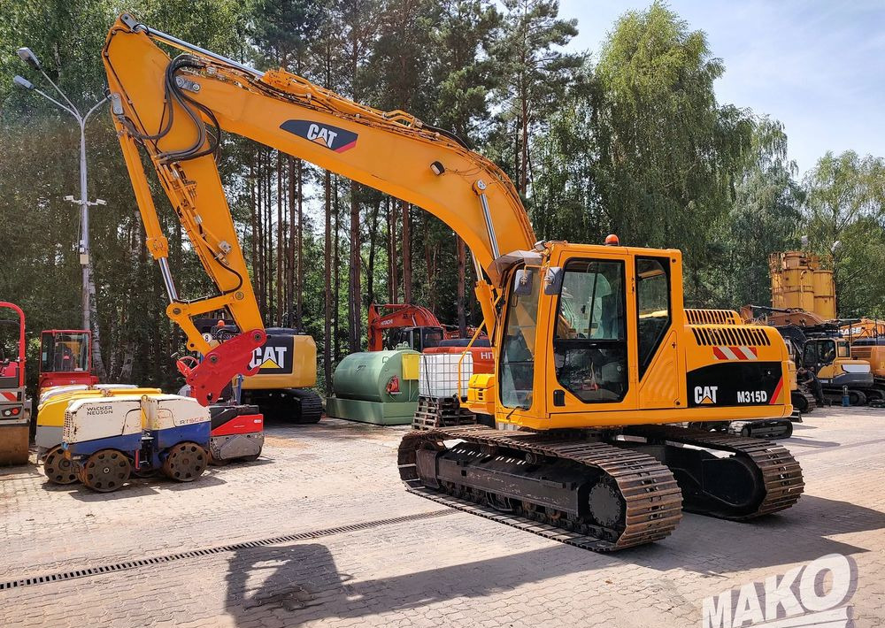 Caterpillar 315D - Kāpurķēžu ekskavators: foto 1 Caterpillar 315D - Kāpurķēžu ekskavators: foto 1