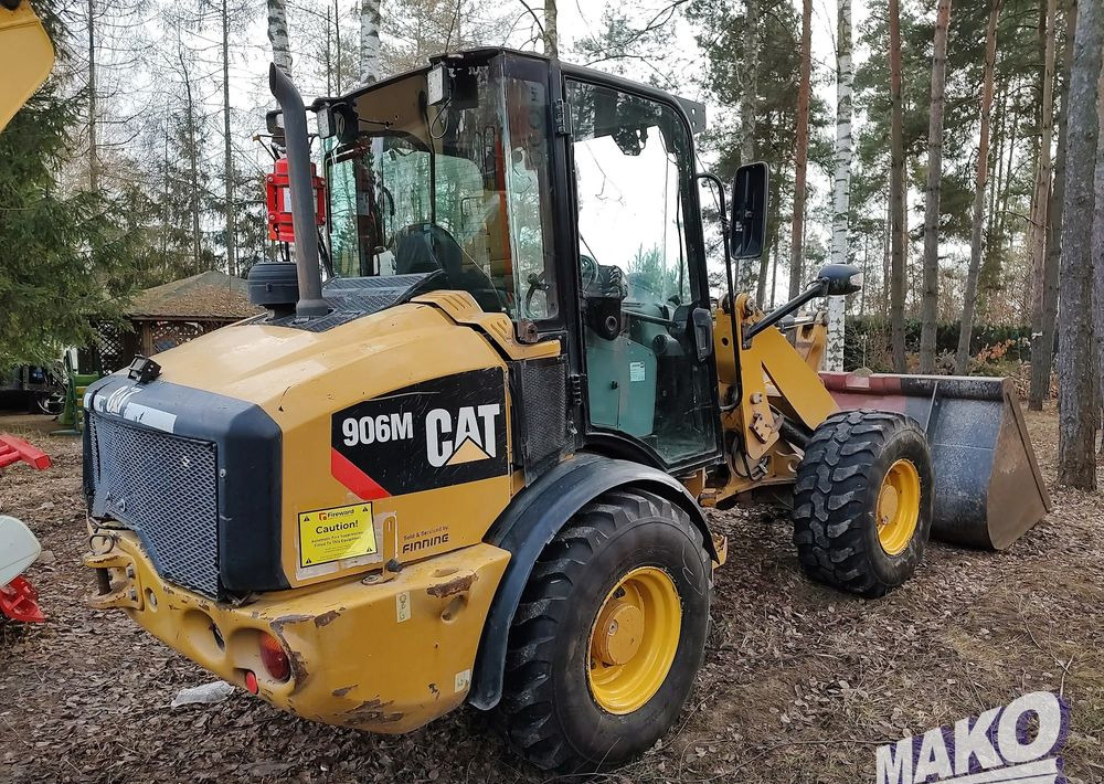 Caterpillar 906M - Riteņu iekrāvējs: foto 1 Caterpillar 906M - Riteņu iekrāvējs: foto 1
