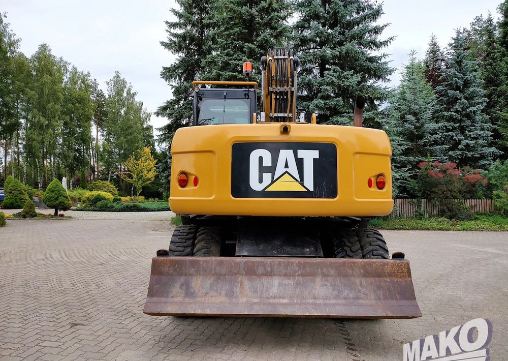 Caterpillar M313D - Riteņu ekskavators: foto 3 Caterpillar M313D - Riteņu ekskavators: foto 3
