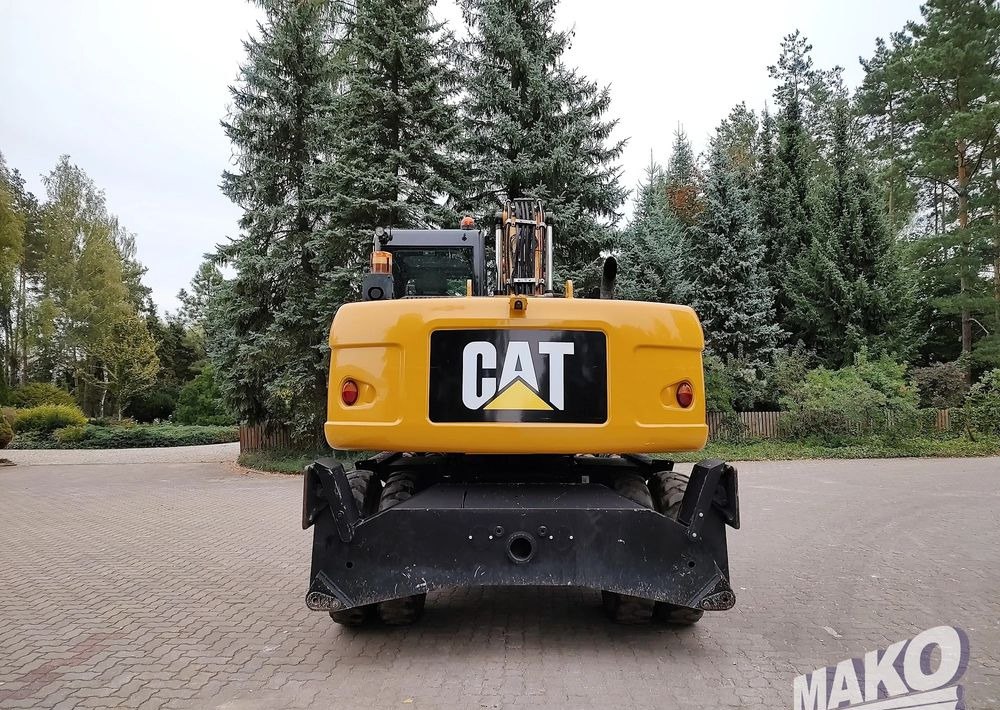 Caterpillar M313D - Riteņu ekskavators: foto 3 Caterpillar M313D - Riteņu ekskavators: foto 3