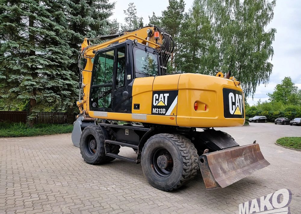 Caterpillar M313D - Riteņu ekskavators: foto 2 Caterpillar M313D - Riteņu ekskavators: foto 2