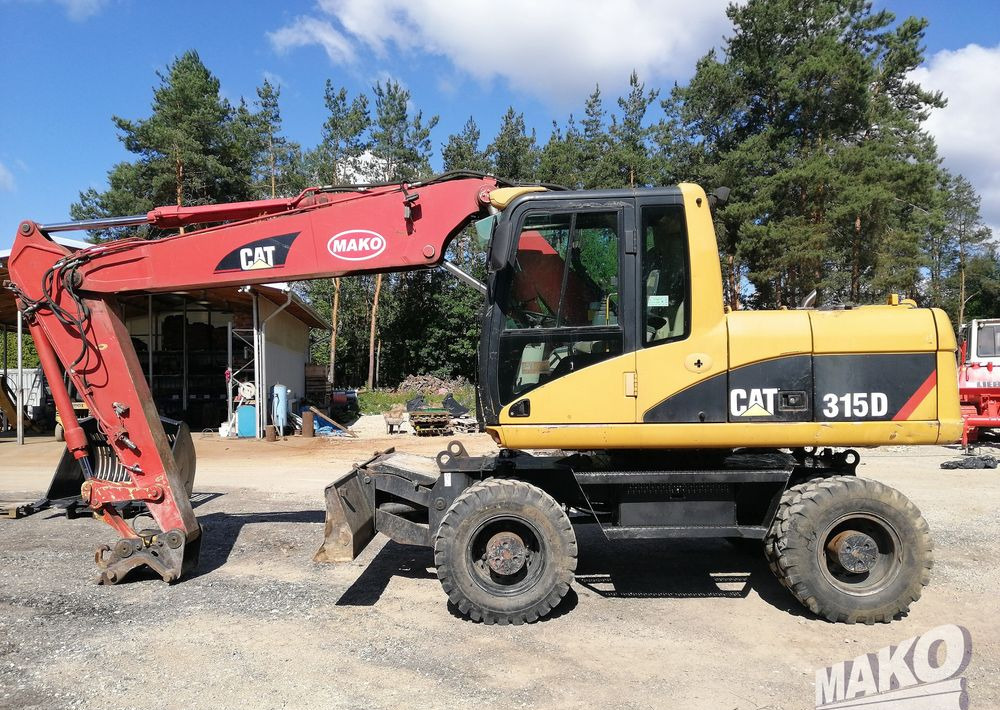 Caterpillar M315 C - Riteņu ekskavators: foto 2 Caterpillar M315 C - Riteņu ekskavators: foto 2
