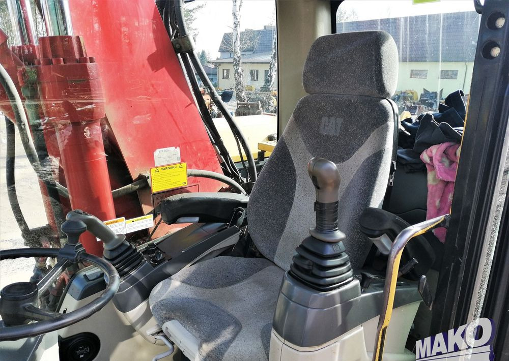 Riteņu ekskavators Caterpillar M315 C: foto 9