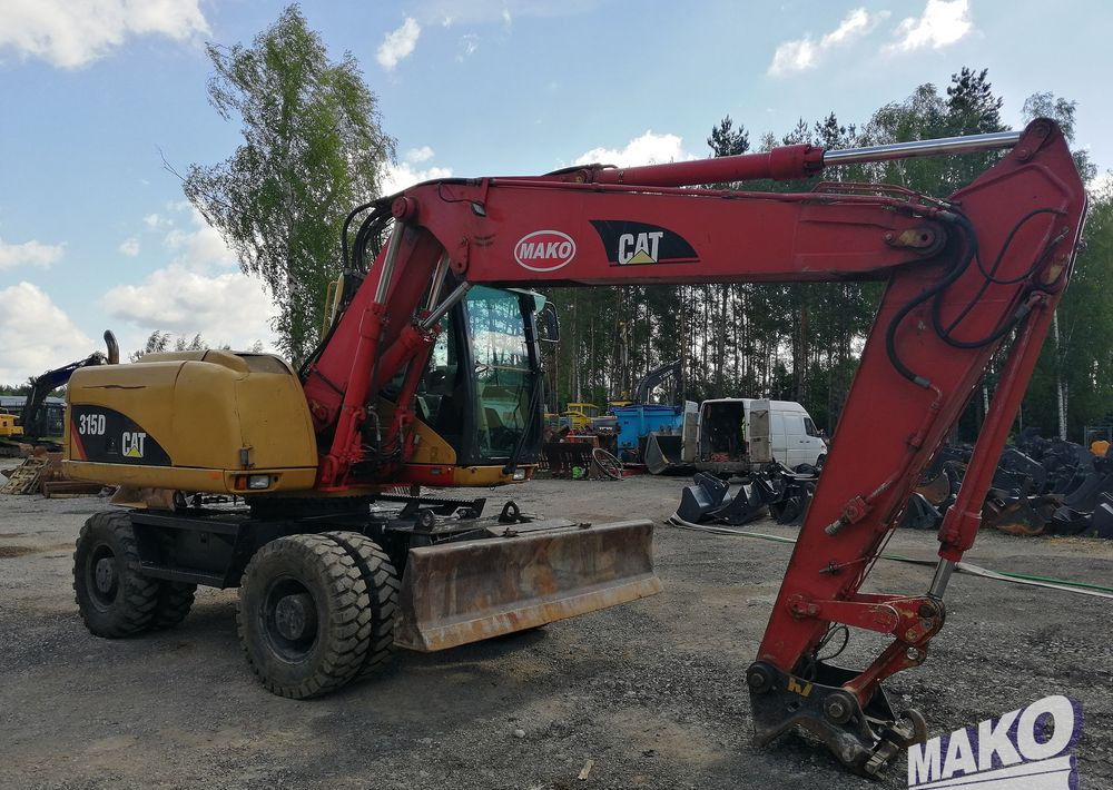 Riteņu ekskavators Caterpillar M315 C: foto 7