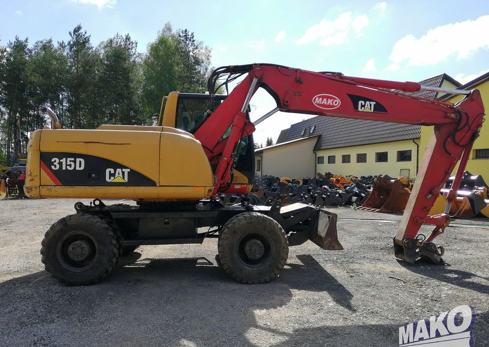 Riteņu ekskavators Caterpillar M315 C: foto 6