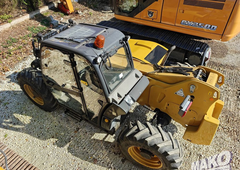 Caterpillar TH407 - Citas iekārtas: foto 2 Caterpillar TH407 - Citas iekārtas: foto 2