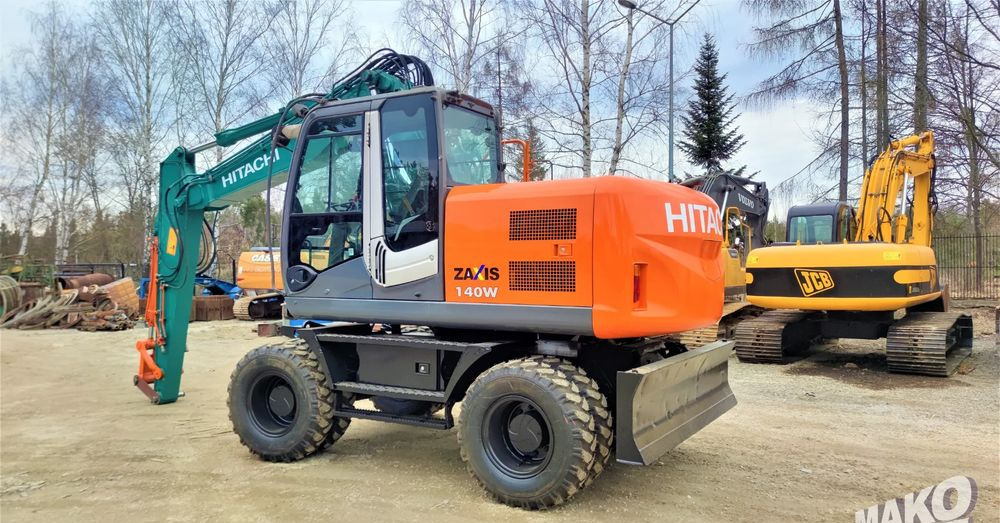 Hitachi ZX140W-3 - Riteņu ekskavators: foto 2 Hitachi ZX140W-3 - Riteņu ekskavators: foto 2