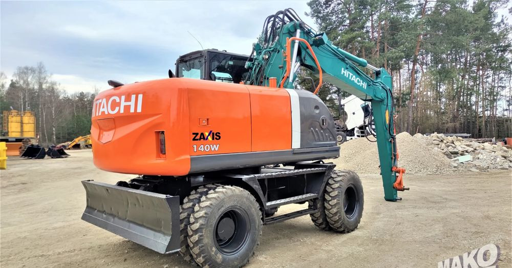 Hitachi ZX140W-3 - Riteņu ekskavators: foto 4 Hitachi ZX140W-3 - Riteņu ekskavators: foto 4