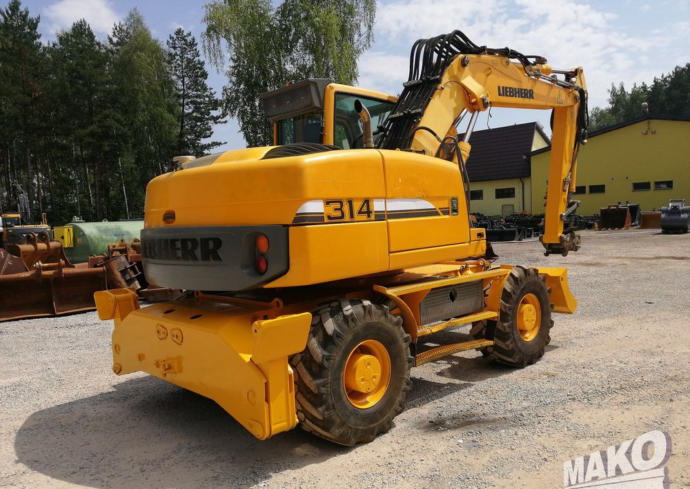 Liebherr A 314 Litronic - Riteņu ekskavators: foto 5 Liebherr A 314 Litronic - Riteņu ekskavators: foto 5