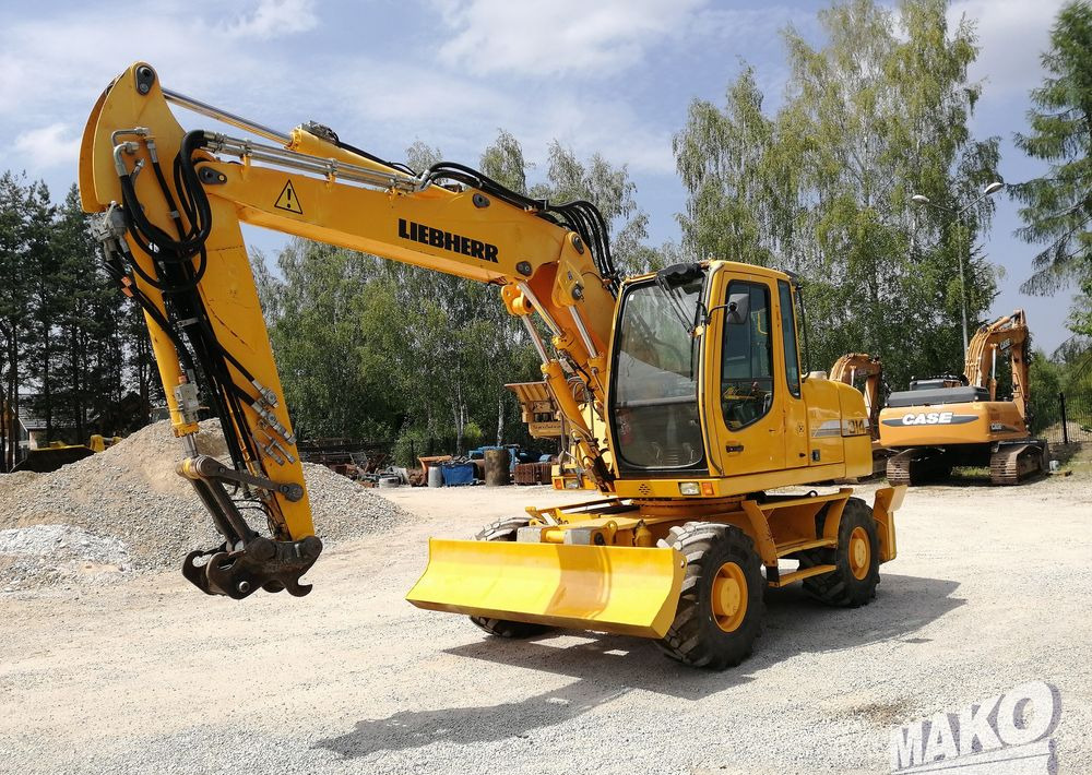 Liebherr A 314 Litronic - Riteņu ekskavators: foto 1 Liebherr A 314 Litronic - Riteņu ekskavators: foto 1
