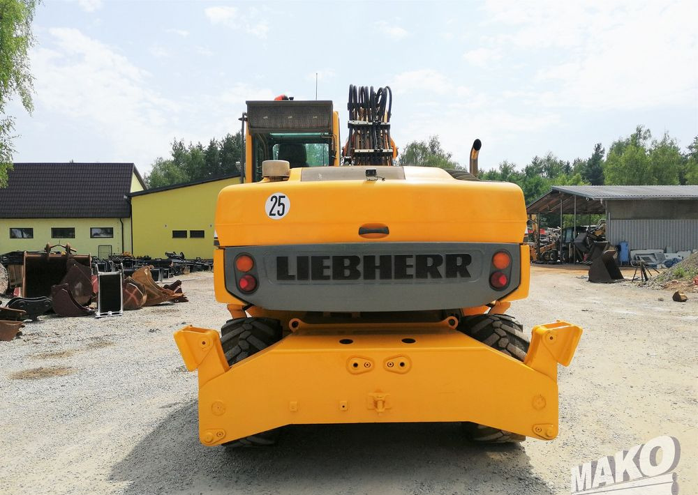 Liebherr A 314 Litronic - Riteņu ekskavators: foto 4 Liebherr A 314 Litronic - Riteņu ekskavators: foto 4