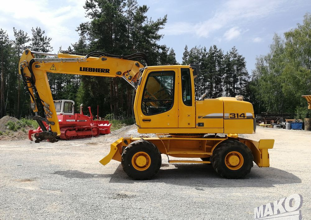 Liebherr A 314 Litronic - Riteņu ekskavators: foto 2 Liebherr A 314 Litronic - Riteņu ekskavators: foto 2