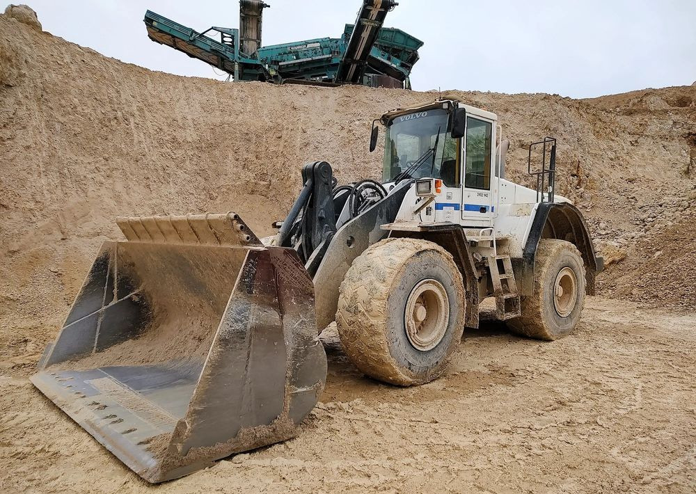 Volvo L180E - Riteņu iekrāvējs: foto 1 Volvo L180E - Riteņu iekrāvējs: foto 1